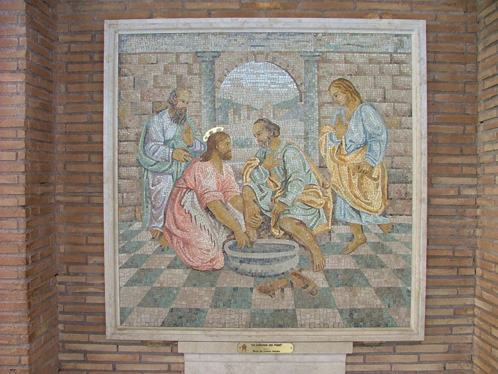 Mosaic depicting the biblical scene of Jesus washing the feet of his disciples during the Last Supper, illustrating humility and servitude.